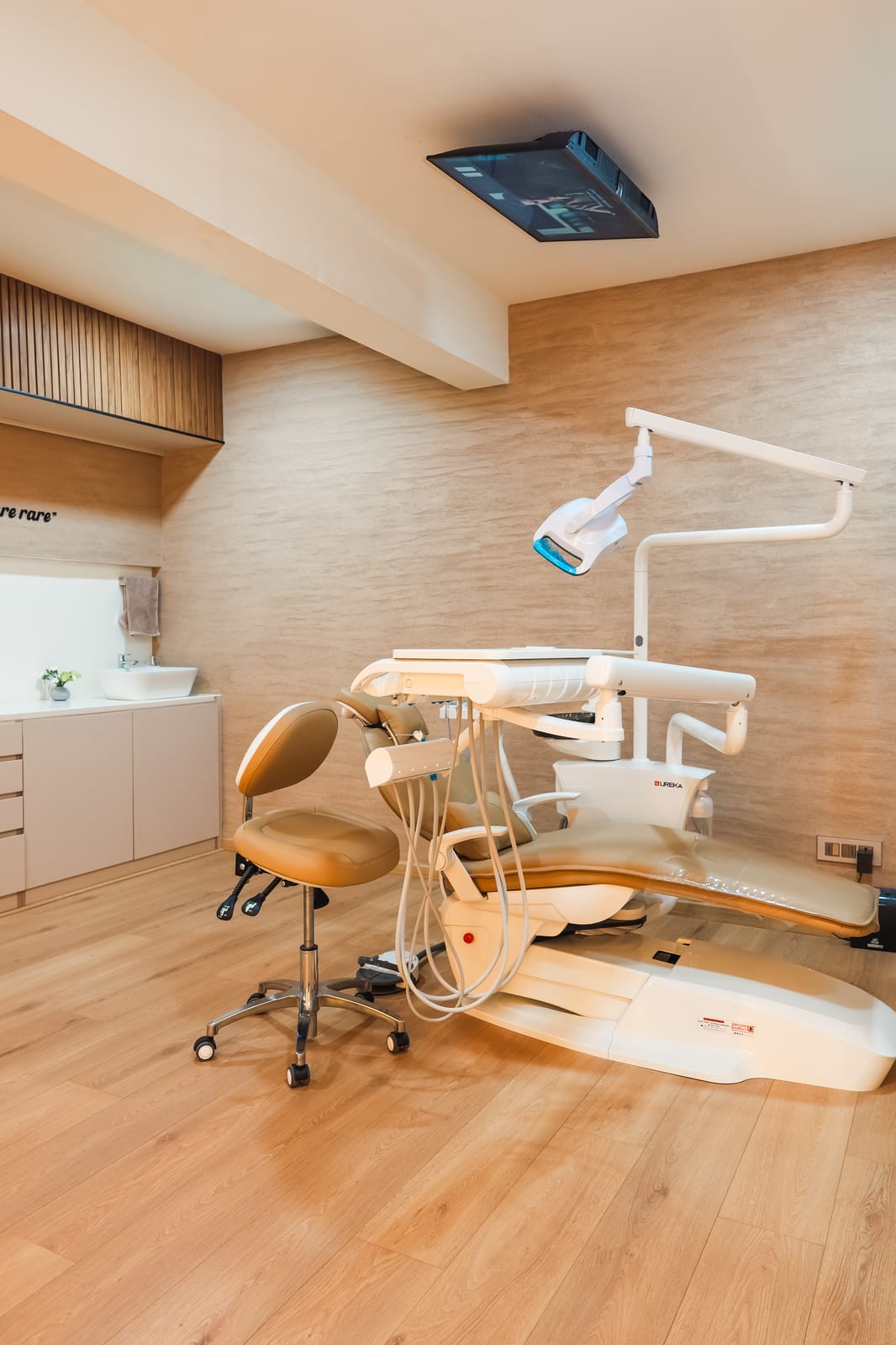 Treatment suite with the dental chair and overhead light